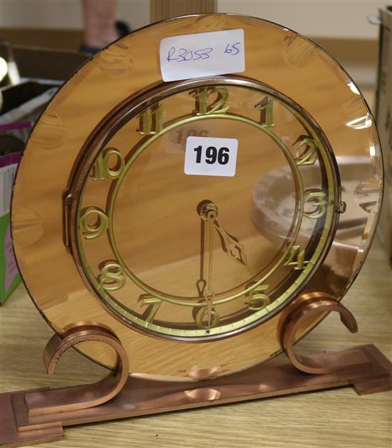 An Art Deco coppered mantel clock